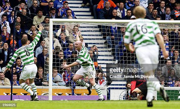 John Hartson of Celtic celebrates his goal during the Bank of Scotland Scottish Premier League match between Glasgow Rangers and Glasgow Celtic held...