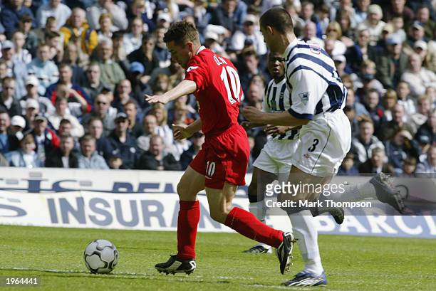 Michael Owen of Liverpool breaks through to score the opening goal during the FA Barclaycard Premiership match between West Bromwich Albion and...