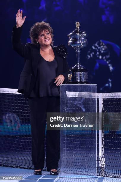 Evonne Goolagong Cawley poses with the Daphne Akhurst Memorial Cup prior to the Women's Singles Final match between Qinwen Zheng of China and Aryna...