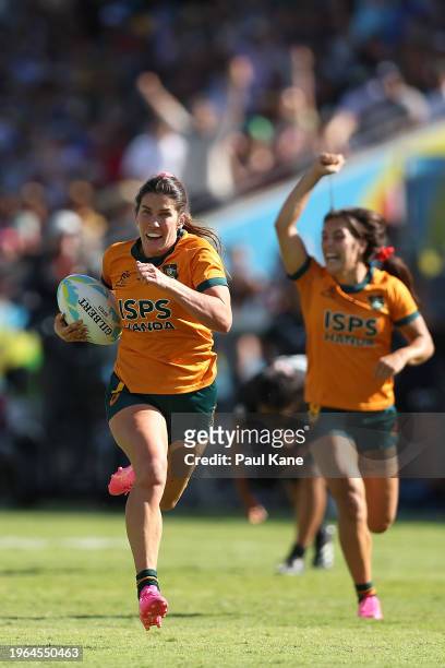Charlotte Caslick of Australia runs in for a try during the 2024 Perth SVNS women's match between New Zealand and Australia at HBF Park on January...