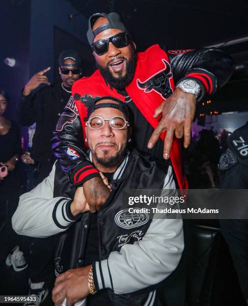 Jeezy and Boston George partying at The Address Bar & Grill on January 27, 2024 in Houston, Texas.