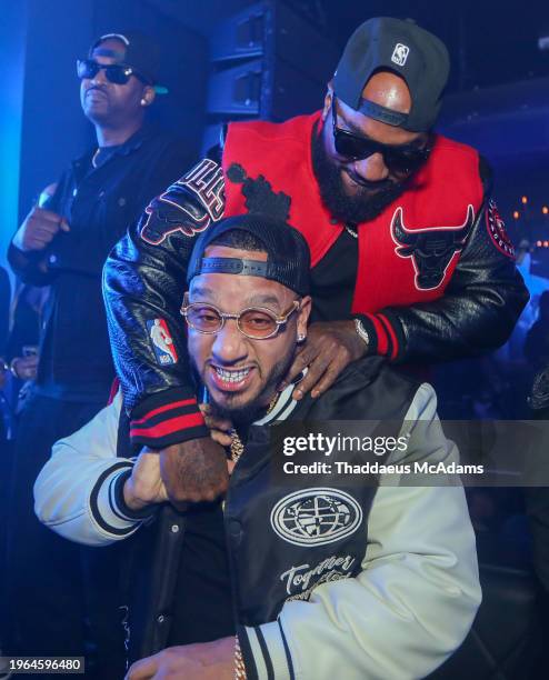 Jeezy and Boston George partying at The Address Bar & Grill on January 27, 2024 in Houston, Texas.