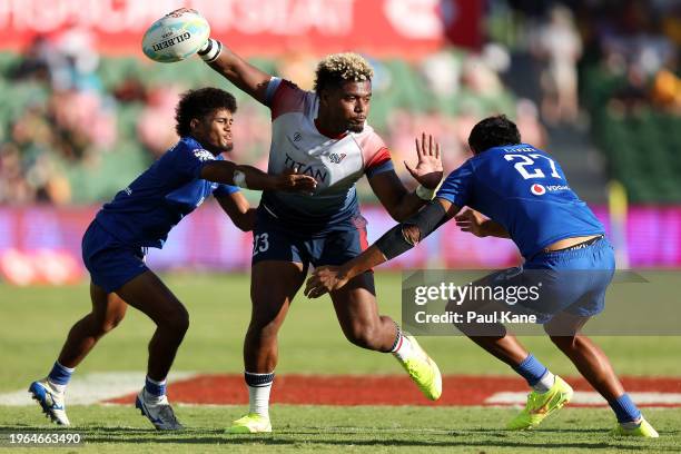 Api Bavadra of Great Britain looks to pass the ball the 2024 Perth SVNS men's match between Samoa and Great Britain at HBF Park on January 27, 2024...