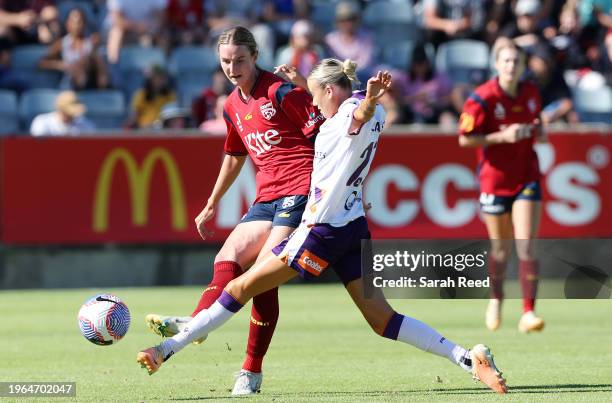 Chelsea Dawber of Adelaide United and Georgia Cassidy of Perth Glory during the A-League Women round 14 match between Adelaide United and Perth Glory...