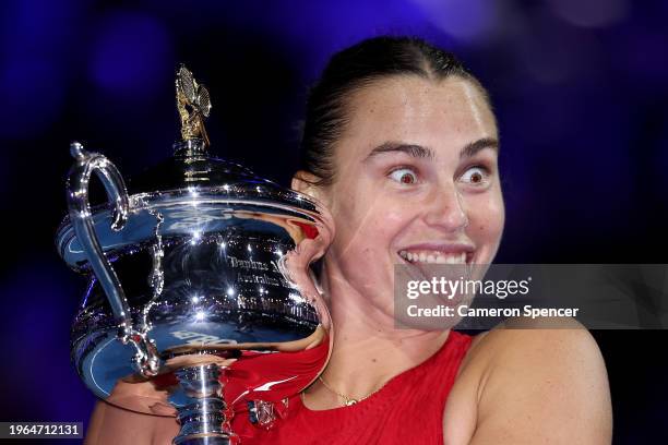 Aryna Sabalenka poses with the Daphne Akhurst Memorial Cup after the the Women's Singles Final match between Qinwen Zheng of China and Aryna...
