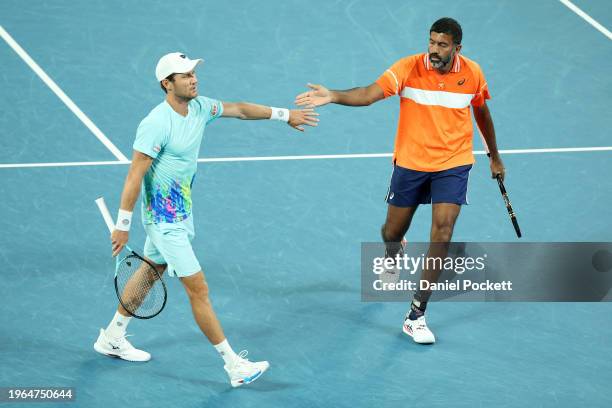 Matthew Ebden of Australia and Rohan Bopanna of India celebrate a point in their Men’s Doubles Final match against Simone Bolelli and Andrea...