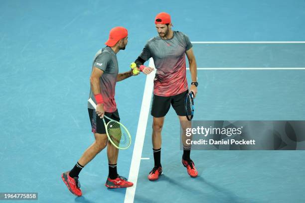 Simone Bolelli and Andrea Vavassori of Italy celebrate a point in their Men’s Doubles Final match against Rohan Bopanna of India and Matthew Ebden of...