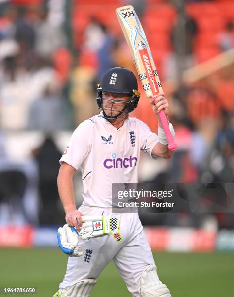 England batsman Ollie Pope raises his bat as he leaves the field 148* after day three of the 1st Test Match between India and England at Rajiv Gandhi...