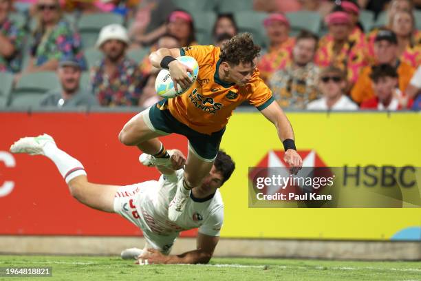Henry Palmer of Australia dives for a try during the 2024 Perth SVNS men's match between USA and Australia at HBF Park on January 27, 2024 in Perth,...