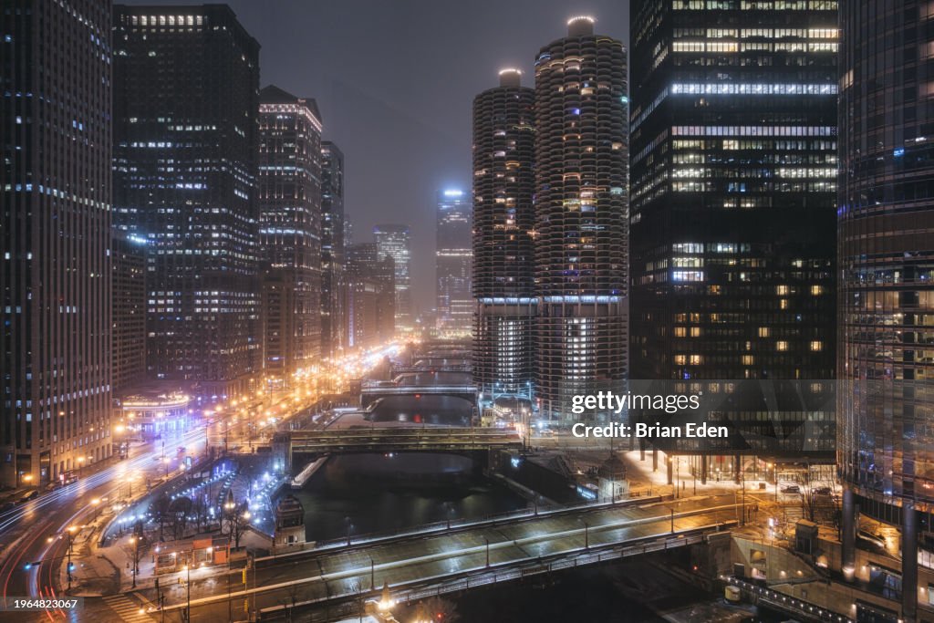 Chicago Cityscape and the Chicago River during a snowstorm at Night