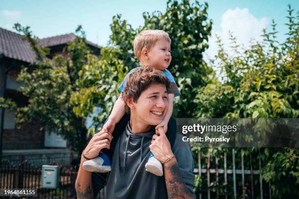 sunshine on my shoulders - uncle stock pictures, royalty-free photos & images