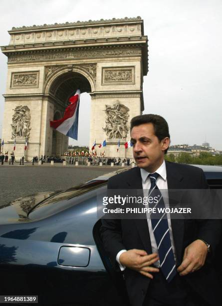 French newly appointed Interior Minister Nicolas Sarkozy arrives at the ceremonies commemorating the end of the second world war in Paris, May 8,...