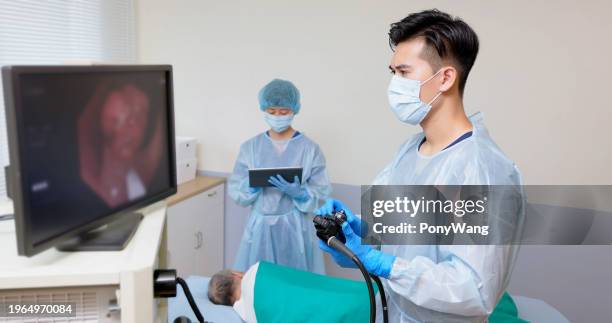 colonoscopy endoscopic examination - colonoscopy-doctor stock pictures, royalty-free photos & images
