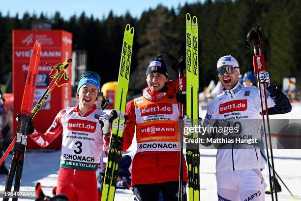 Second Place Stefan Rettenegger of Austria, First Place Jarl Magnus Riiber of Norway, and Third Place Joergen Graabak of Norway, pose for a photo...