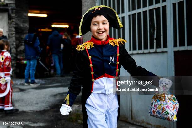 Child dressed as Napoleon participates during the Napoleon-themed Coumba Freida Carnival on January 27, 2024 in Doues near Aosta, Italy. The typical...