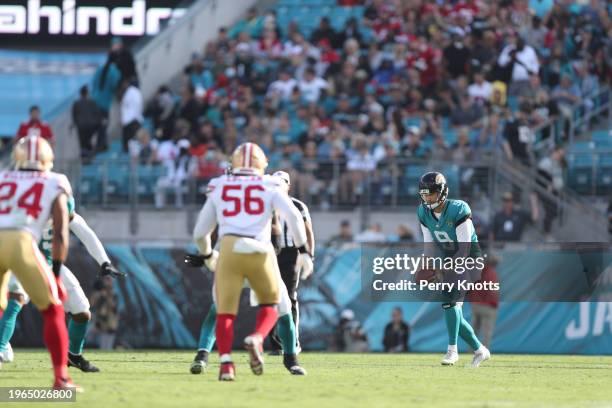 Logan Cooke of the Jacksonville Jaguars punts during a game against the San Francisco 49ers at TIAA Bank Field on November 21, 2021 in Jacksonville,...