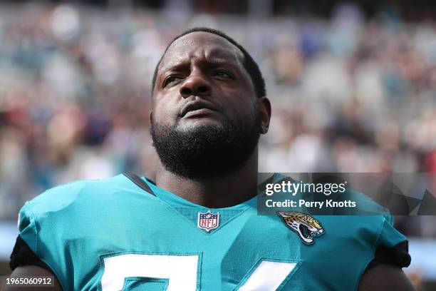 Cam Robinson of the Jacksonville Jaguars stands during the national anthem prior to the game against the San Francisco 49ers at TIAA Bank Field on...