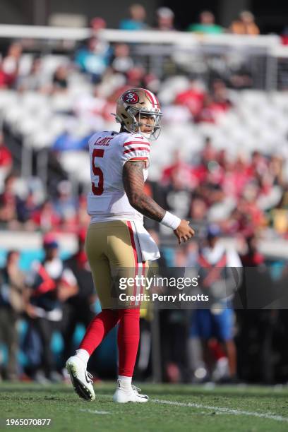 Trey Lance of the San Francisco 49ers stands on the field during a game against the Jacksonville Jaguars at TIAA Bank Field on November 21, 2021 in...