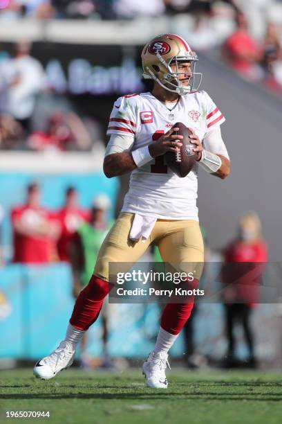 Jimmy Garoppolo of the San Francisco 49ers looks to throw a pass during a game against the Jacksonville Jaguars at TIAA Bank Field on November 21,...