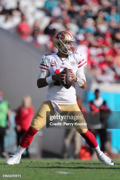 Jimmy Garoppolo of the San Francisco 49ers looks to throw a pass during a game against the Jacksonville Jaguars at TIAA Bank Field on November 21,...