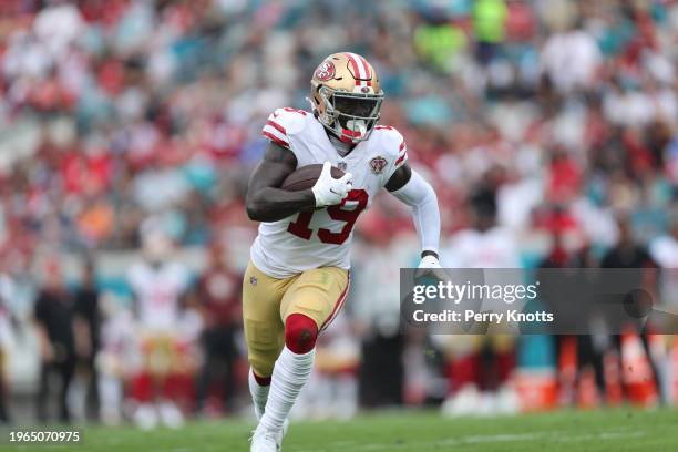 Deebo Samuel of the San Francisco 49ers runs upfield during a game against the Jacksonville Jaguars at TIAA Bank Field on November 21, 2021 in...