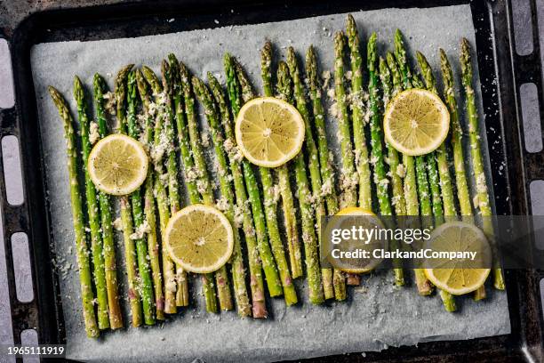 lemon roasted asparagus - asparagus stock pictures, royalty-free photos & images