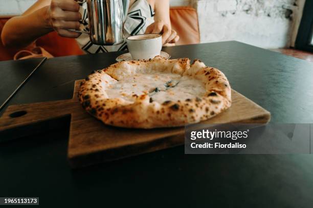pizza on the table - carboidrato componente di organismo vivente foto e immagini stock