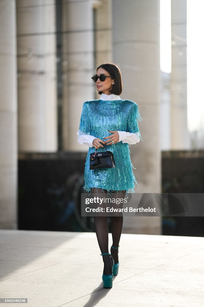 Street Style - Paris Fashion Week - Haute Couture Spring/Summer 2024 - Day Three
