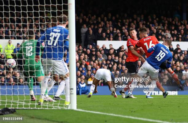 Vitaliy Mykolenko of Everton scores their sides own goal during the Emirates FA Cup Fourth Round match between Liverpool and Norwich City at Goodison...