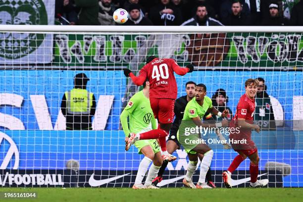 Faride Alidou of 1.FC Köln scores their sides first goal past Koen Casteels of VfL Wolfsburg during the Bundesliga match between VfL Wolfsburg and 1....