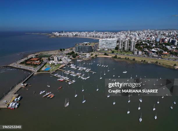 Aerial view showing yachts and other vessels anchored at the Yacht Club Uruguayo in Buceo neighbourhood, by the Rio de la Plata estuary in...