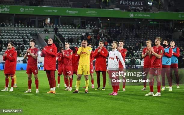 Players of 1.FC Köln applaud fans following the Bundesliga match between VfL Wolfsburg and 1. FC Köln at Volkswagen Arena on January 27, 2024 in...