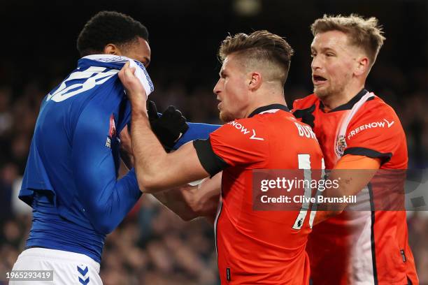 Youssef Chermiti of Everton clashes with Reece Burke of Luton Town during the Emirates FA Cup Fourth Round match between Liverpool and Norwich City...