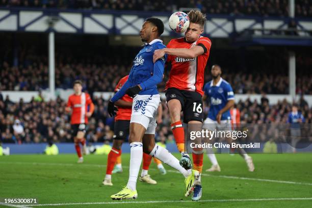Youssef Chermiti of Everton competes for a header with Reece Burke of Luton Town during the Emirates FA Cup Fourth Round match between Liverpool and...