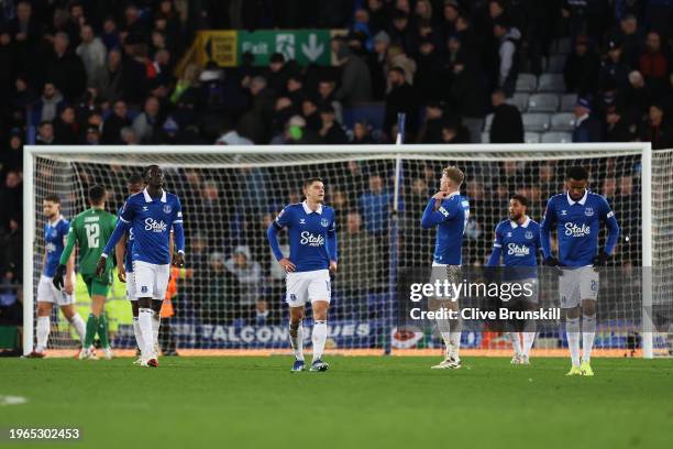 Vitaliy Mykolenko and team mates of Everton look dejected after Cauley Woodrow of Luton Town scores their sides second goal during the Emirates FA...