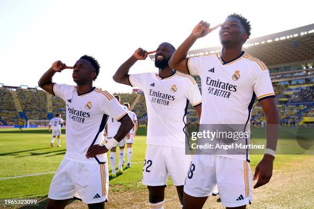 Aurelien Tchouameni of Real Madrid celebrates with team mates Vinicius Junior and Antonio Ruediger after scoring their sides second goal during the...