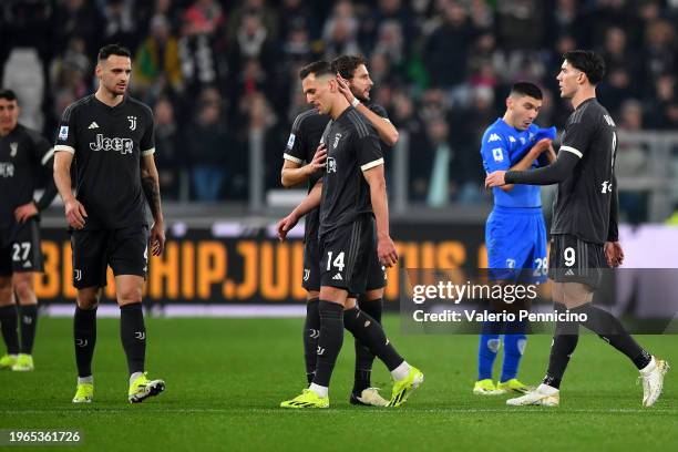 Arkadiusz Milik of Juventus is consoled by Manuel Locatelli of Juventus after being shown a red card during the Serie A TIM match between Juventus...