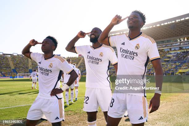 Aurelien Tchouameni of Real Madrid celebrates with Antonio Rudiger and Vinicius Junior after scoring their sides second goal during the LaLiga EA...