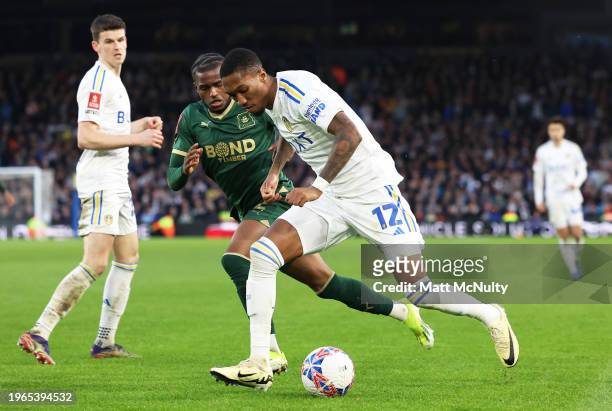 Jaidon Anthony of Leeds United battles for possession with Bali Mumba of Plymouth Argyle during the Emirates FA Cup Fourth Round match between Leeds...