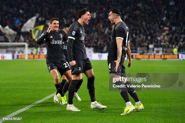 Dusan Vlahovic of Juventus celebrates with team mate Federico Gatti after scoring their sides first goal during the Serie A TIM match between...