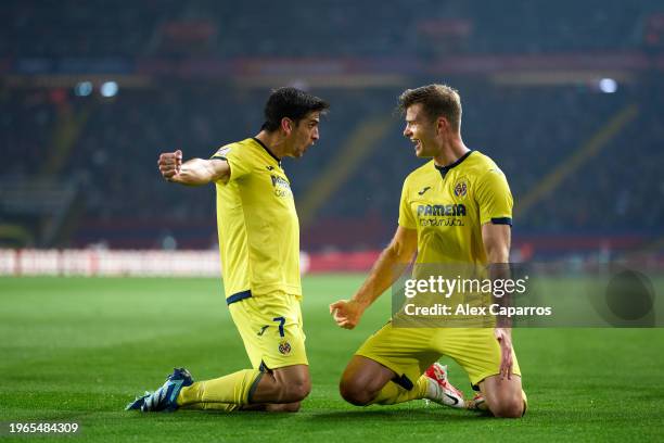 Gerard Moreno of Villarreal CF celebrates with his teammate Alexander Sorloth after scoring their team's frst goal during the LaLiga EA Sports match...