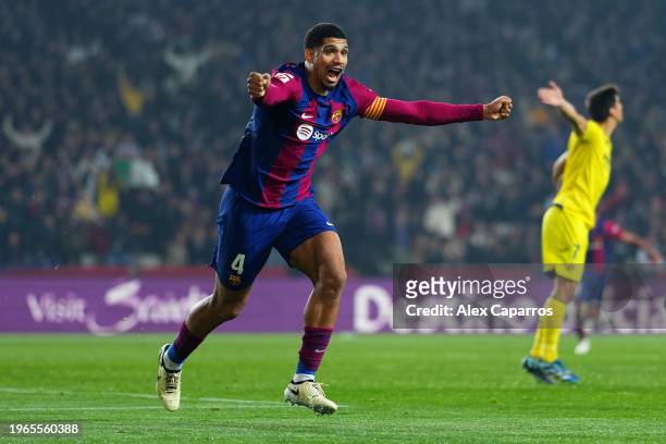 Ronald Araujo of FC Barcelona celebrates as Eric Bailly of Villarreal CF scores an own-goal during the LaLiga EA Sports match between FC Barcelona...