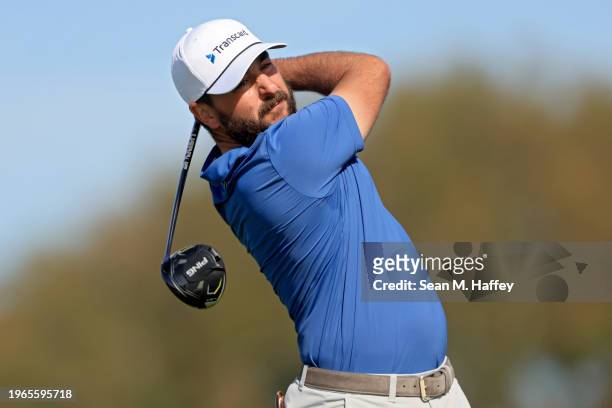 Stephan Jaeger of Germany plays his shot from the second tee during the final round of the Farmers Insurance Open at Torrey Pines South Course on...