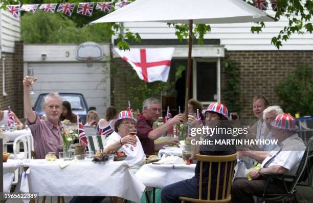 Bracknell, Berkshire, neighbors mark the Golden Jubilee of Britain's Queen Elizabeth II at one of the numerous street parties held across the United...