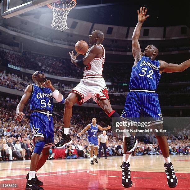 Michael Jordan of the Chicago Bulls shoots a layup against the Orlando Magic in Game two of the Eastern Conference Finals during the 1996 NBA...