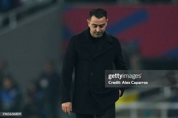 Xavi, Head Coach of FC Barcelona, looks dejected at full-time following their team's defeat in the LaLiga EA Sports match between FC Barcelona and...