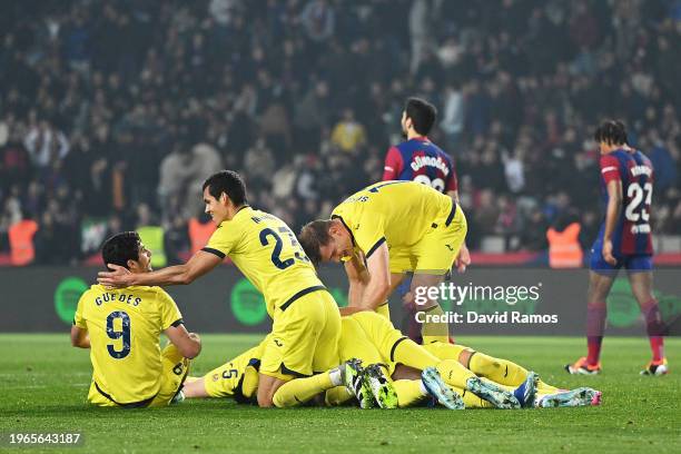 Jose Luis Morales of Villarreal CF celebrates scoring his team's fifth goal with teammates during the LaLiga EA Sports match between FC Barcelona and...