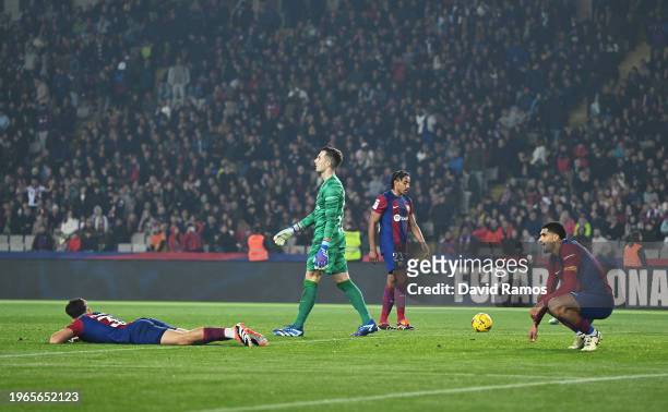 Pau Cubarsi, Inaki Pena, Jules Kounde and Ronald Araujo of FC Barcelona look dejected after Alexander Sorloth of Villarreal CF scores his team's...