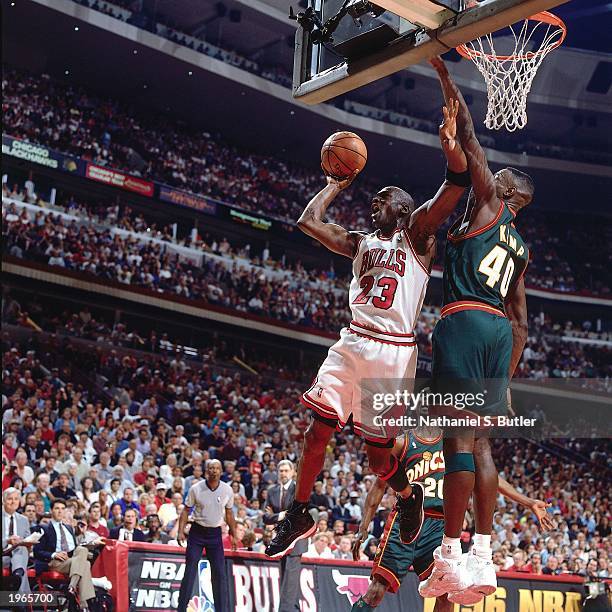 Michael Jordan of the Chicago Bulls drives to the basket against the Seattle SuperSonics during Game six of the 1996 NBA Finals at the United Center...