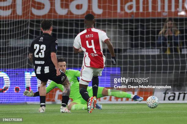 Jizz Hornkamp of Heracles Almelo scores his team's first goal past Diant Ramaj of Ajax during the Dutch Eredivisie match between Heracles Almelo and...